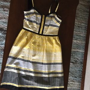 Madison Leigh black and yellow dress.